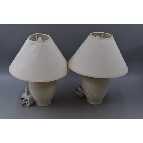 379 - Two small cream table lamps (13