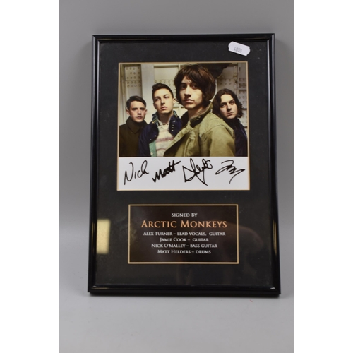 506 - A Framed and Glazed Arctic Monkeys Facsimile Signed Presentation, Approx 31cm x 22cm