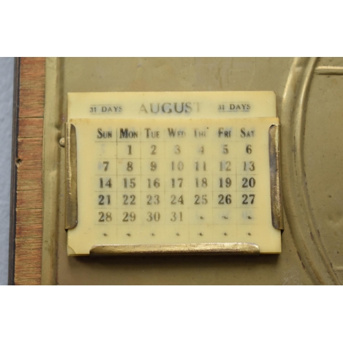 177 - A Vintage Mr Pickwick (Pickwick Papers) Wood and Brass Perpetual Calendar, AF