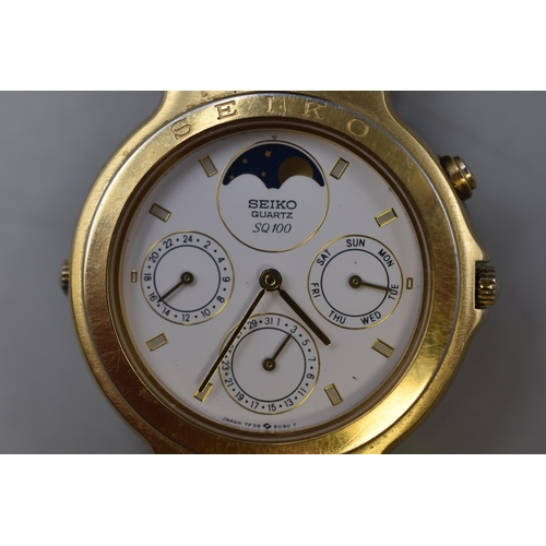 96 - A Gents Seiko SQ100 Quartz Moon Phase Watch With Original Gold Tone Strap. Working