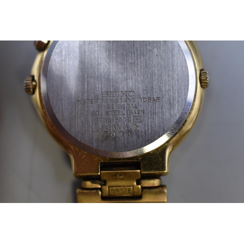 96 - A Gents Seiko SQ100 Quartz Moon Phase Watch With Original Gold Tone Strap. Working