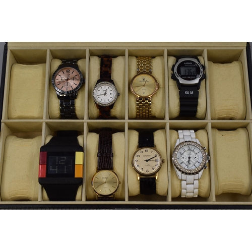 103 - A Faux Brown Leather Twelve Watch Presentation Box With A Selection of Eight Watches. Includes Sekon... 