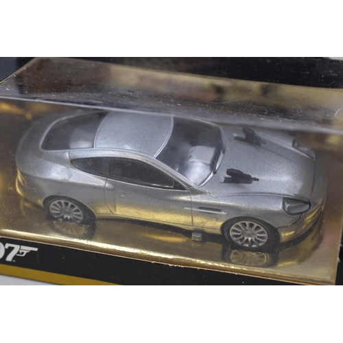 162 - Two Boxed Corgi Diecast James Bod Cars To Include The Living Daylights Aston Martin Volante, And Die... 