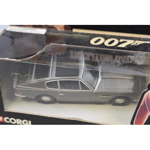 162 - Two Boxed Corgi Diecast James Bod Cars To Include The Living Daylights Aston Martin Volante, And Die... 