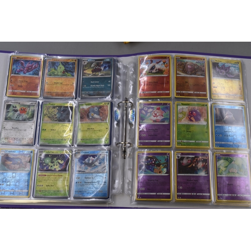 165 - Three Folders of Assorted Modern Pokemon Cards To Include Holo, Reverse Holo, And More