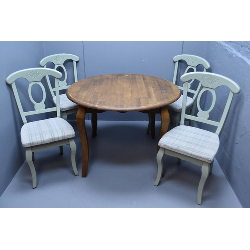 519 - A Set of Four Pastel Green Wooden Dining Chairs With Etched Floral Design Backrest and Check Seat (A... 