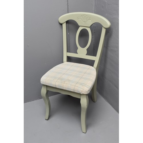 519 - A Set of Four Pastel Green Wooden Dining Chairs With Etched Floral Design Backrest and Check Seat (A... 