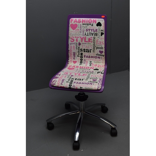 526 - Two office chairs, one purple and wood with leather seat and one pink and mesh with cushion fabric s... 