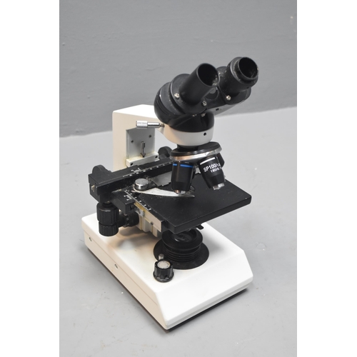 291 - A Scientific Microscope (Lights Up When Tested), With A Large Selection of Specimen Slides, And Vari... 