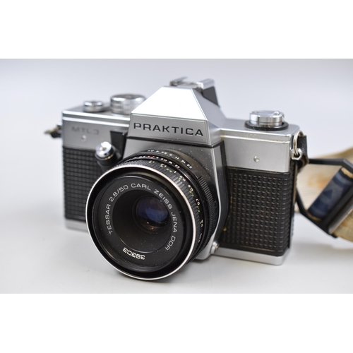 326 - A Praktica MTL 3 SLR Camera With Carl Zeiss 2.8/50 Lens, With Vivitar Flash Unit. In Leather Hard Ca... 