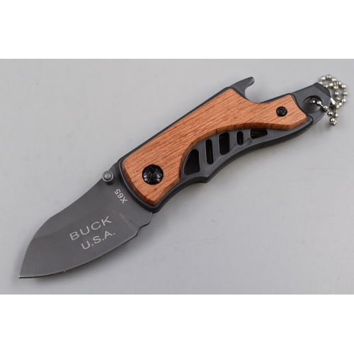 354 - A Buck X65 Pocket Knife, Approx 14cm Long