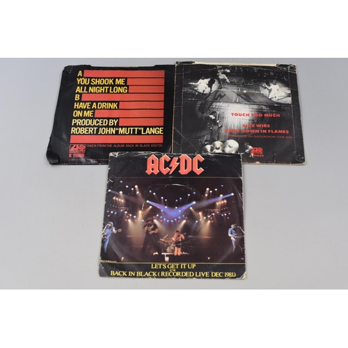 426 - Three AC/DC Vinyl Singles To Include Lets Get it Up/Back in Black, Touch Too Much/Live Wire Shot Dow... 