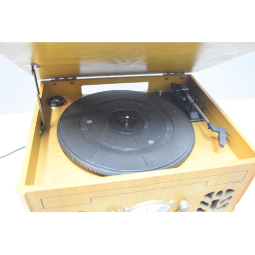 454 - A Vintage Style Wood Cased Music Station (CD, FM, Tape, And Record Deck), Powers On When Tested