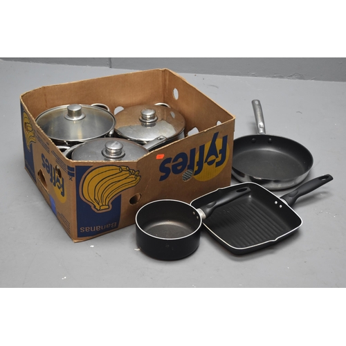 687 - Kitchen items to include stainless steel 2 large and casseroles, 2 sauce pans (one lidded) frying pa... 