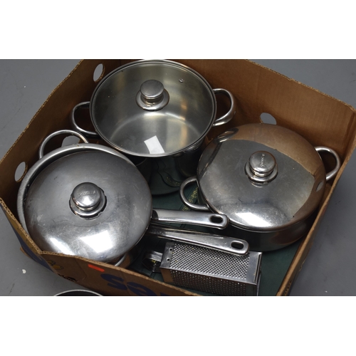 687 - Kitchen items to include stainless steel 2 large and casseroles, 2 sauce pans (one lidded) frying pa... 