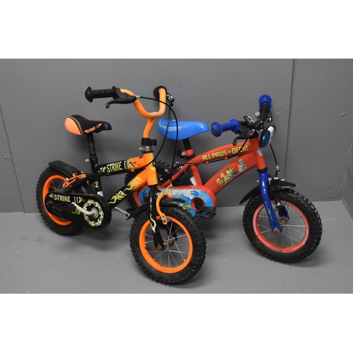 472 - Strike 2 orange and black kids bike with paw patrol kids bike with damaged pedal