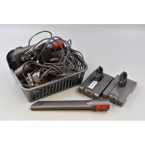 478 - Dyson hoover accessories including battery chargers and batteries with some hoover attachments (A/F)