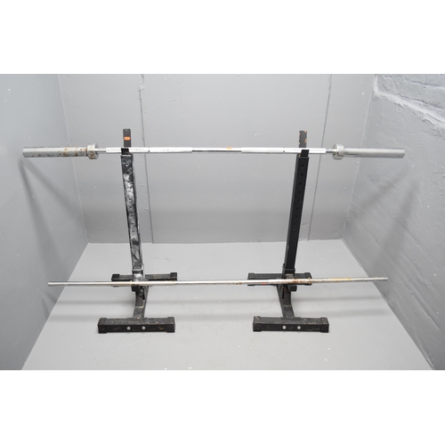 564 - A pair of squat stands, a 