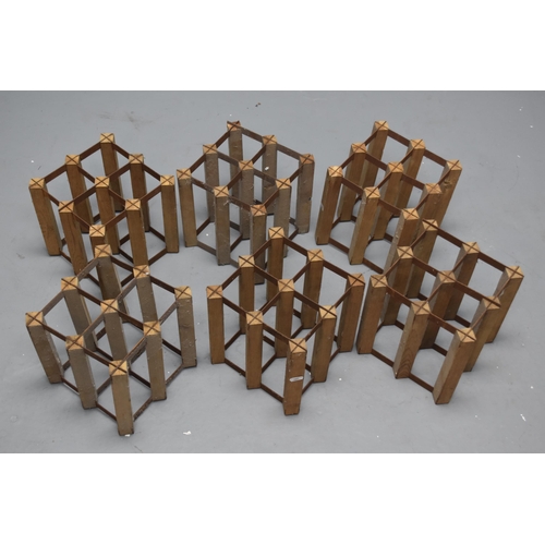 565 - A Set of Six Wood and Metal Wine Bottle Holders, Each Holds Up To Six Bottles