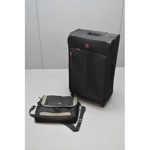 505 - Large black very light weight suit case measures 36