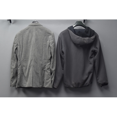 694 - Two Jackets to Include A New Paul Jones Corduroy Gents Grey Jacket (Size Small) & A Nike Reversi... 