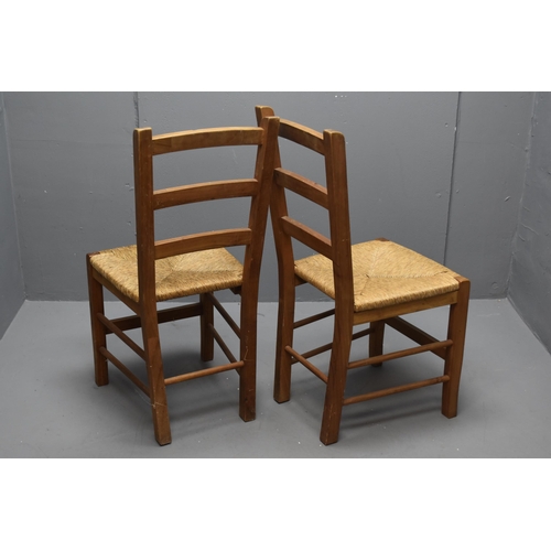 542 - A Pair of Modern Ladder Back Wicker Seated Dining Chairs. Approx 92cm Tall