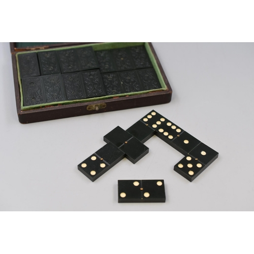 42 - A Set of Early Green Bakelite Dominoes, In Leather Case