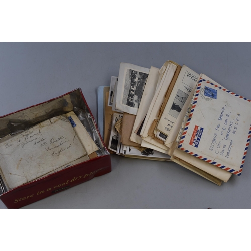 301 - A vintage OXO box containing photos and letters pertaining to an Army soldier Pte Barnish from Much ... 