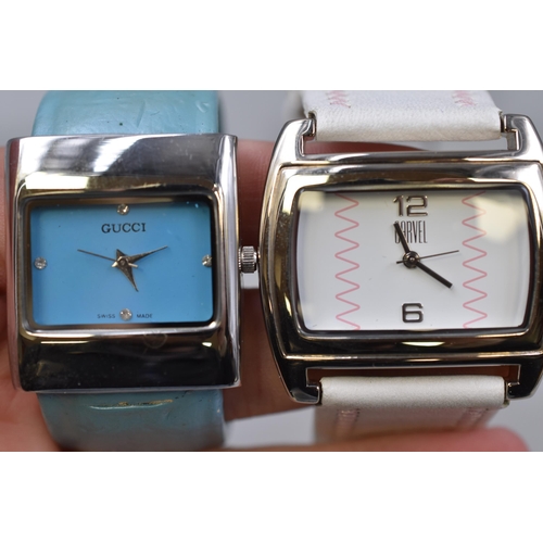 100 - Two ladies watches to include Gucci slip on in blue and a Carvel in white both in working condition