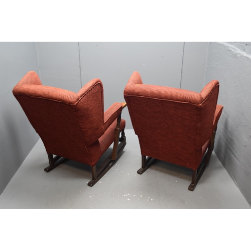 348 - Two vintage red rocking chairs (35