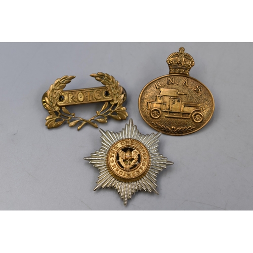 248 - Three Military Badges including Royal Naval Air Service, Cheshire Regiment, and Reserve Officers Tra... 