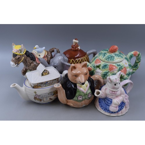 280 - Six novelty tea pots to include Elephant, Fox, Donkey, Mouse, Noahs ark and Strawberry plant