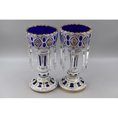 297 - A Pair of Bohemian Blue, White and Gold Gilt Floral Glass Table Lustres. Approx 30cm Tall, One is Sl... 