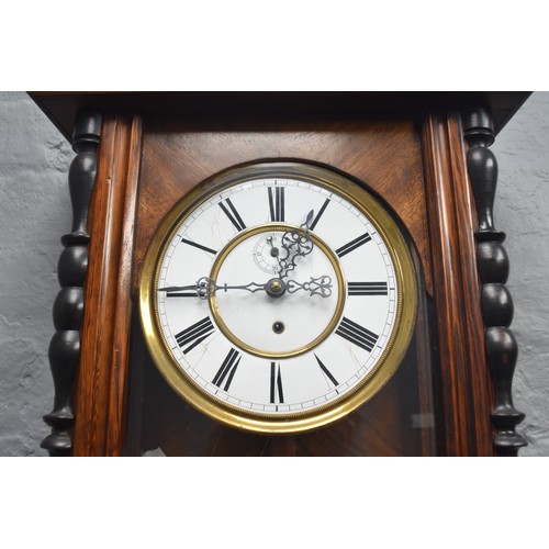 520 - An Early 20th Century Weight Driven Vienna Wall Clock With Eagle Finial, Key and Weight. Approx 120c... 