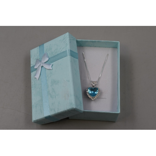 50 - A 925. Silver Necklace Chain With Blue Heart Stoned 18ct White Gold Plated Pendant. In Presentation ... 