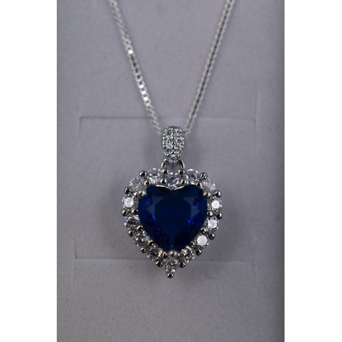 51 - A 925. Silver Blue Heart Surrounded By Clear Stones Pendant Necklace, In Presentation Box