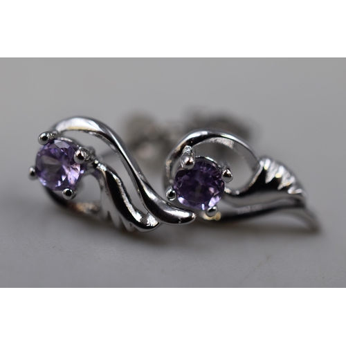 22 - A Pair of 925. Silver Purple Stoned Angel Wing Earrings, In Presentation Box