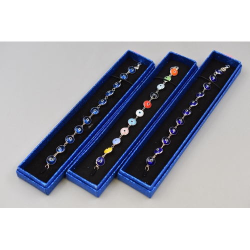 38 - Three Silver 925 Evil Eye Good Luck Bracelets in Various Colours, Complete with Presentation Boxes