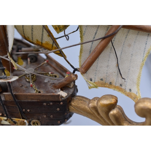 301 - Band o gold model ship of a galleon ship with cannons and mini figurines (A/F) (20