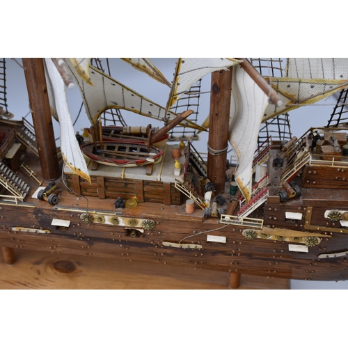 301 - Band o gold model ship of a galleon ship with cannons and mini figurines (A/F) (20