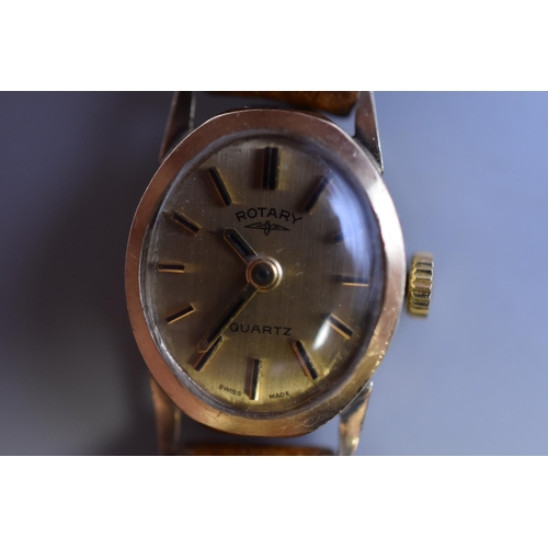 43 - Ladies Rotary quartz wrist watch with 375 gold case and brown leather strap in working condition