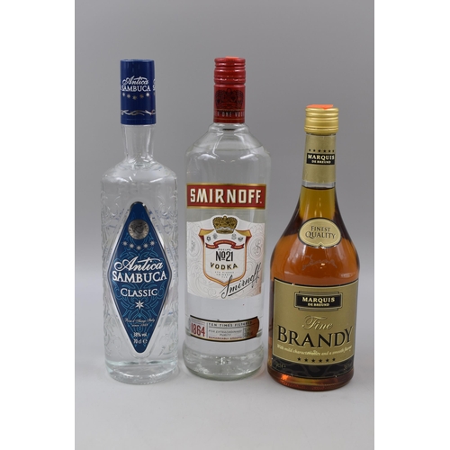 138 - Three Bottles of Alcohol To Include Smirnoff Vodka (1l, Sealed), Antica Sambuca (70cl, Sealed), And ... 