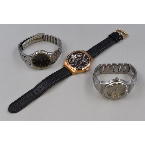 86 - Three Gents Watches To Include Seiko SQ Day/Date Quartz Watch, Storm Day/Time Watch, And GT Precisio... 