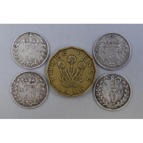 160 - Four Victoria Silver Threepences and a 1946 Threepence