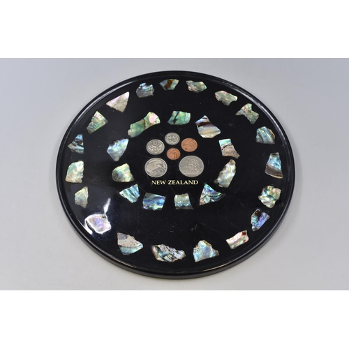 173 - A New Zealand Mint Coin Set Tray Surrounded By Paua Shell, Approx 30cm Diameter