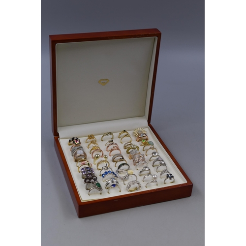 178 - A Selection of Fifty Designer Rings, In Presentation Box