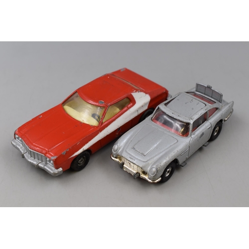 190 - Two Vintage Iconic Playworn Corgi Vehicles to include Starsky and Hutch Gran Torino and 007 Aston ma... 