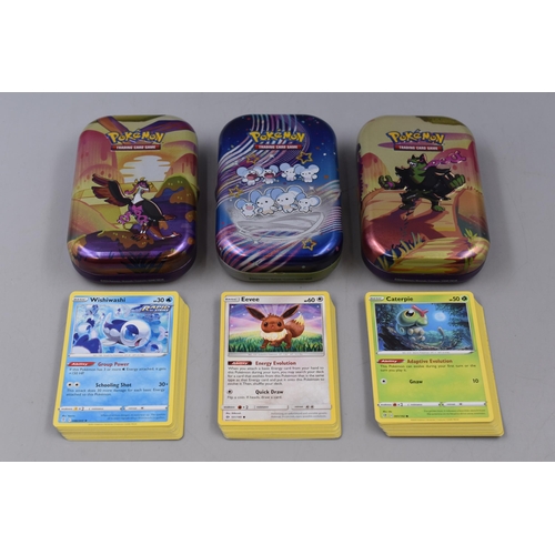 202 - Three Pokemon Collectors Tins Containing Assorted Modern Pokemon Cards