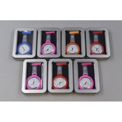 253 - Seven Brand New Nurses Fob Watches in Various Colours with Storage Tins