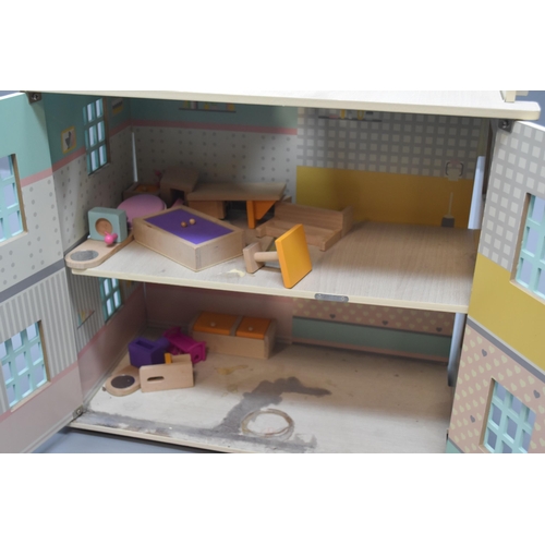 543 - Wooden dolls house with some furniture (A/F)